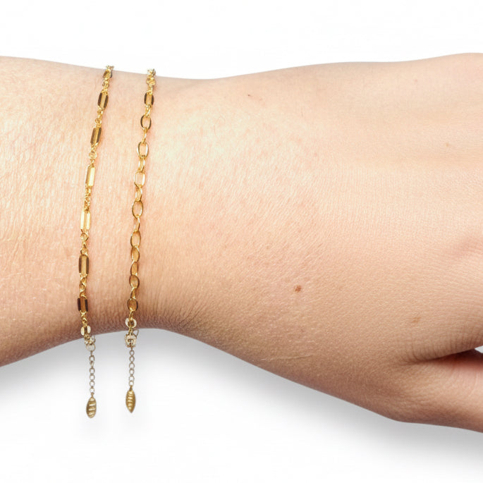 Gold chain bracelet on wrist