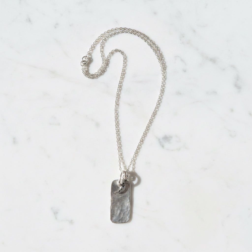 Sterling silver necklace with engraved pendant and moon detail