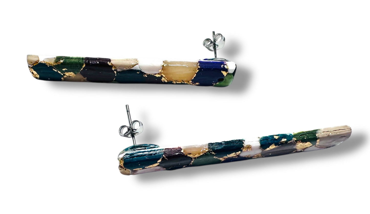 Matching striped jewelry earrings with gold details