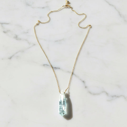 Gold chain necklace with aquamarine pendant