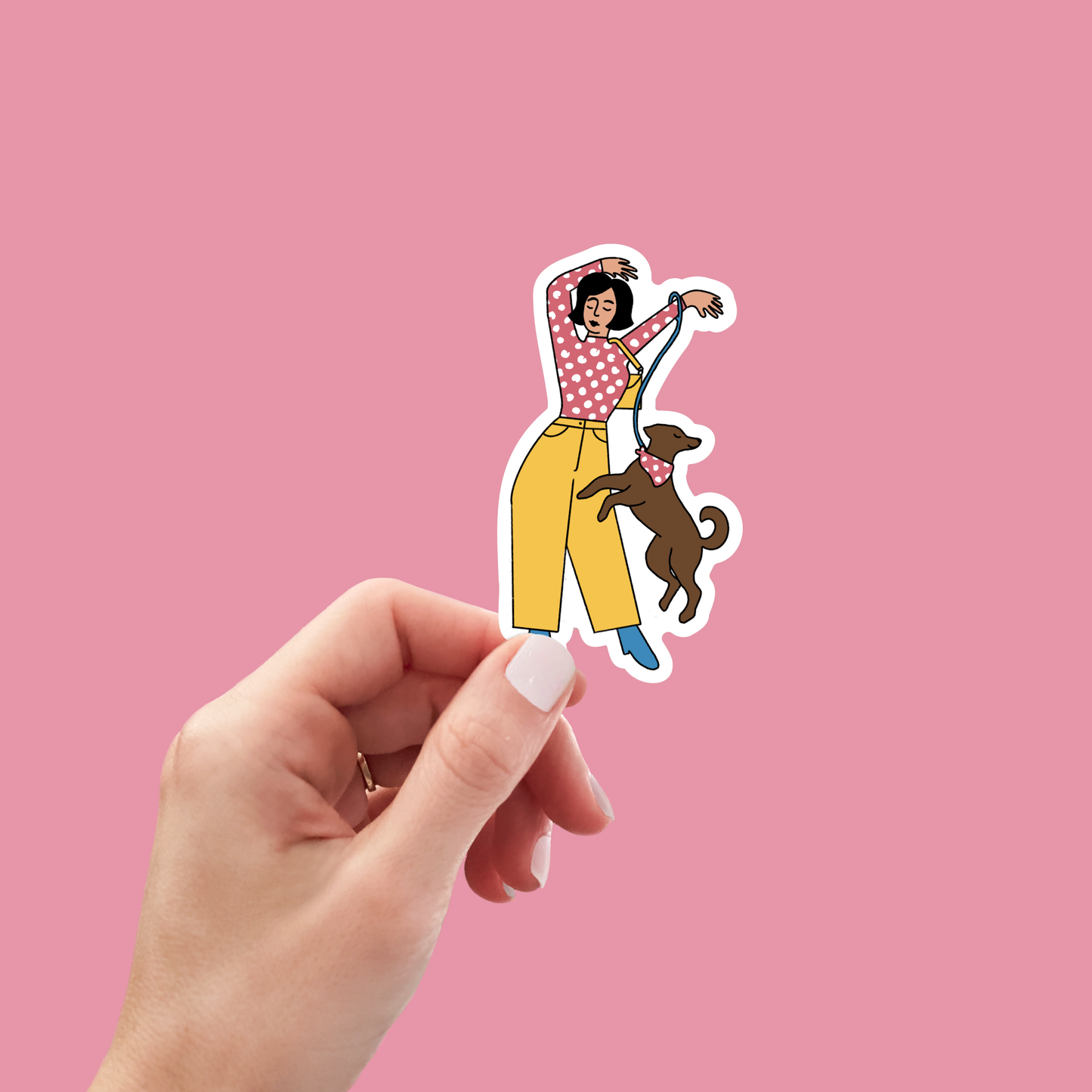 Hand holding Pansexual Pride Dog Sticker - Waterproof Decal with a girl and her dog, ideal for laptops, water bottles, and more.