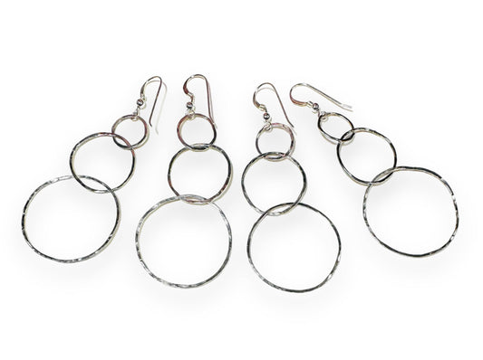 HoopLink Earrings - Silver Gold Hoop Earrings featuring two pairs of silver triple hoop dangle earrings with soldered links for long-lasting use.