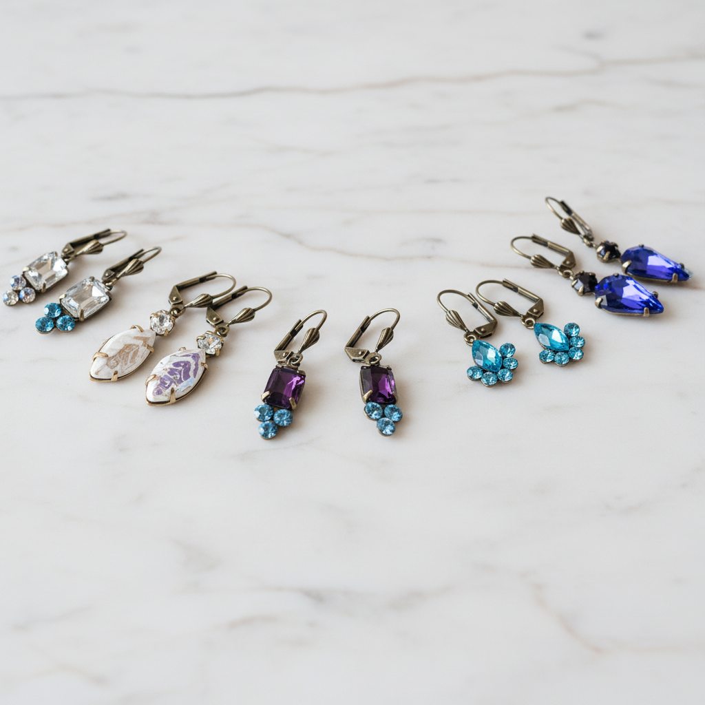 Collection of colorful crystal earrings with various designs