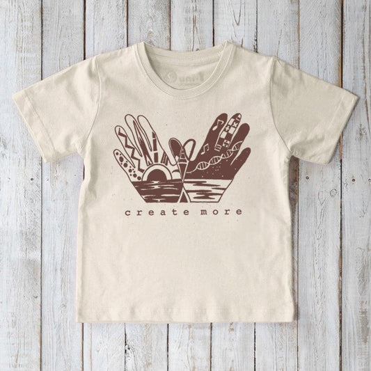 Beige Kids' Organic Cotton Graphic T-Shirt featuring 'Create More' hand design, sustainable and artistic top for young creators by Uni-T.