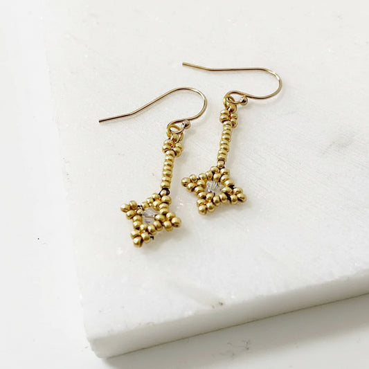 Gold Crystal Woven Earrings featuring intricate beadwork and crystal center. Lightweight and stylish for everyday elegance.