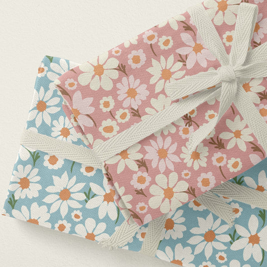 Floral tea towel with daisies and pink background