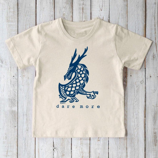 Natural cream Kids' Organic Cotton T-Shirt with blue dragon graphic and 'dare more' text. Sustainable mythical creature top by Uni-T.