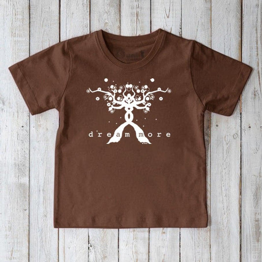 Brown Kids' Organic Cotton T-Shirt featuring white 'Dream More' uplifting graphic. Sustainable motivational shirt for children by Uni-T.