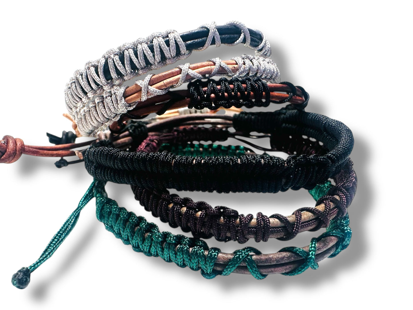 Stack of woven fabric bracelets with cords