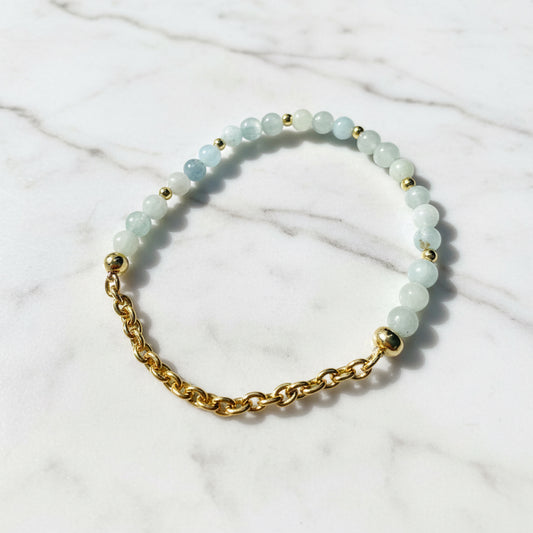Elegant gemstone and chain bracelet with gold accents