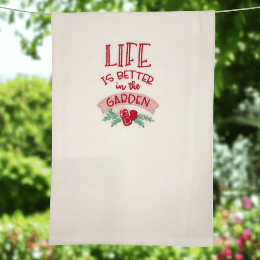 Life is Better in the Garden embroidered towel hanging outdoors, perfect for garden lovers and kitchen décor in the Home & Garden category.