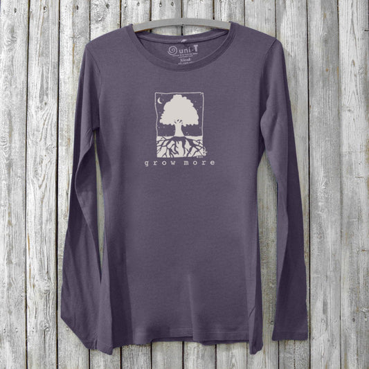 Eco-friendly women's long sleeve graphic tee in purple with 'Grow More' tree design, made from bamboo and organic cotton for plant lovers.