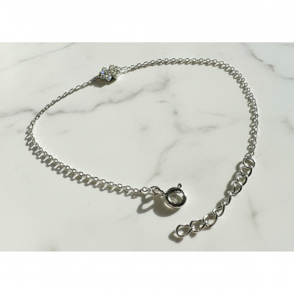 Silver chain bracelet with heart and clasp details