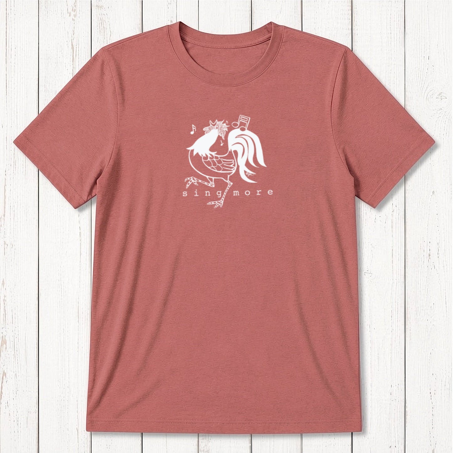 Rust red men's 'Sing More' rooster t-shirt in bamboo and organic cotton, featuring a light-colored humorous farm animal print.