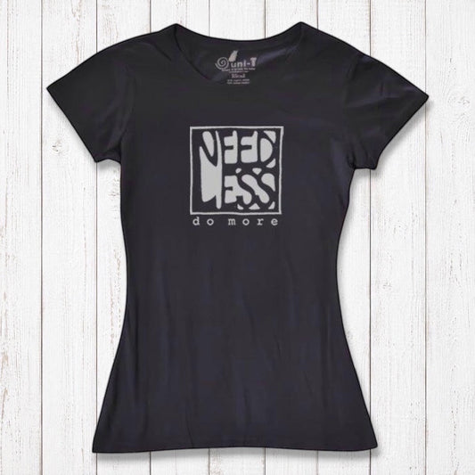 Black women's bamboo and organic cotton t-shirt with 'Need Less Do More' graphic. Sustainable inspirational gift for minimalist lifestyle.