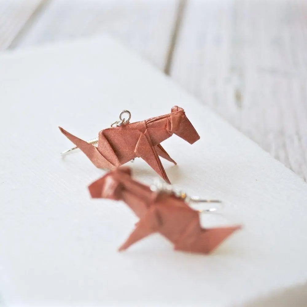 Handmade Origami Dog Earrings in brown with silver hooks, showcasing folded paper dog design. Ideal accessory for animal and origami enthusiasts.