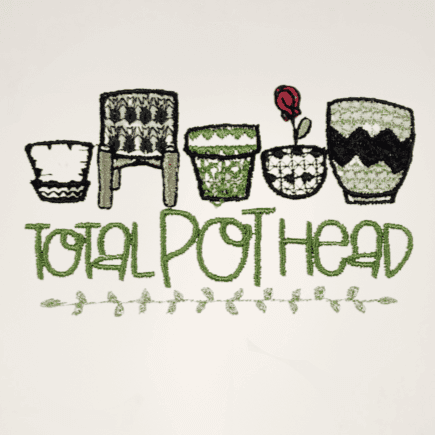Close-up of Total Pot Head Embroidered Towel - Plant-Themed Accessory featuring five colorful embroidered plant pots and playful green text.