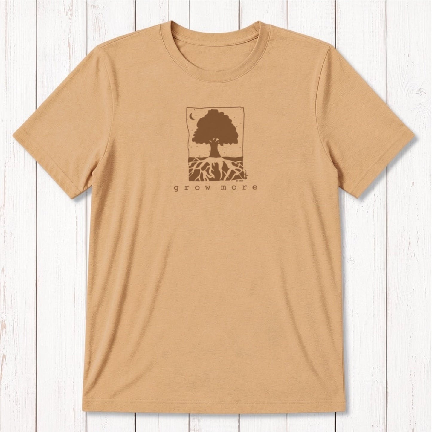 Golden tan men's bamboo and organic cotton t-shirt with green 'Grow More' tree and root gardening graphic.