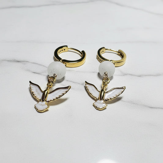 Gold and white enamel hoop earrings with gemstone accents and bird charms