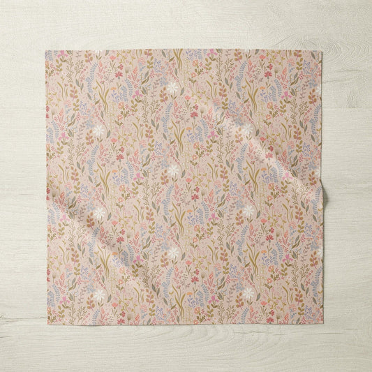 Pink floral patterned tablecloth with matching napkin