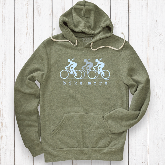 Heather olive hoodie on white wood.png