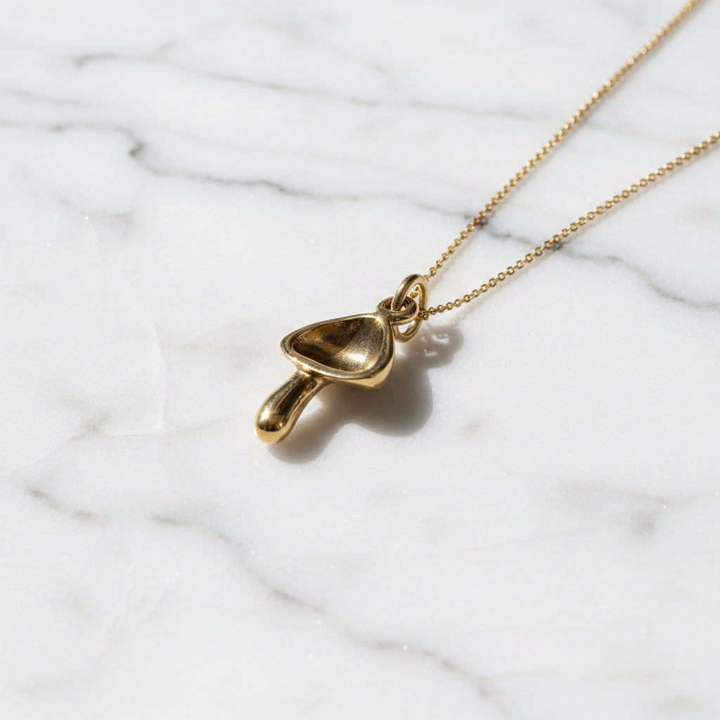 Dainty Golden Mushroom Necklace* on white background