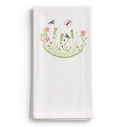 Uni-T white flour sack kitchen towel featuring delicate embroidery of pink flowers, butterflies, and dragonflies.