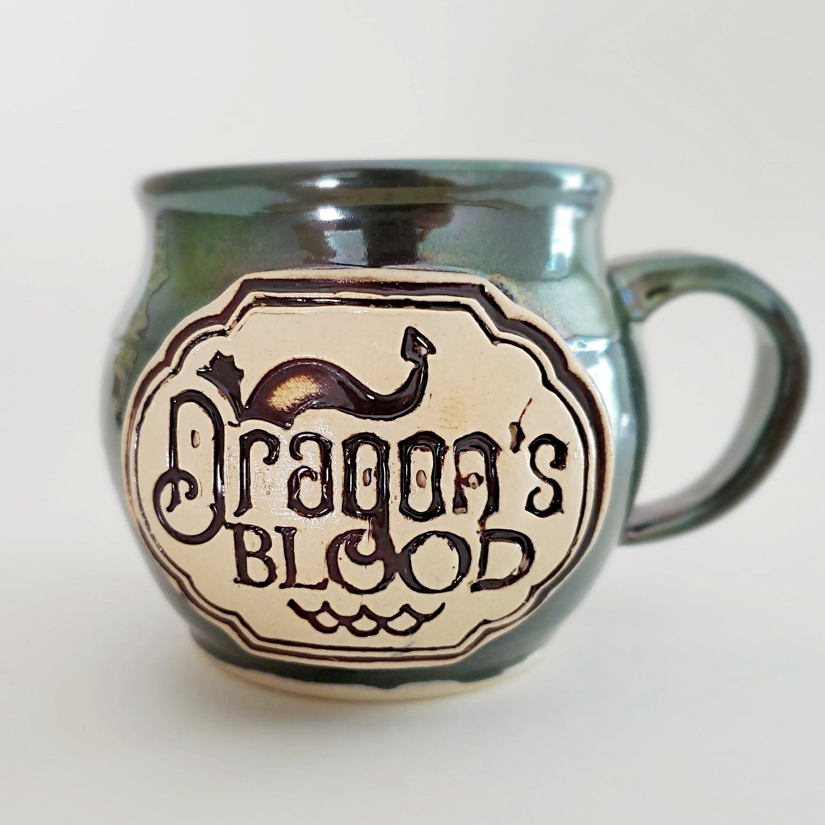 Dragon's Blood mug green Megan Twing