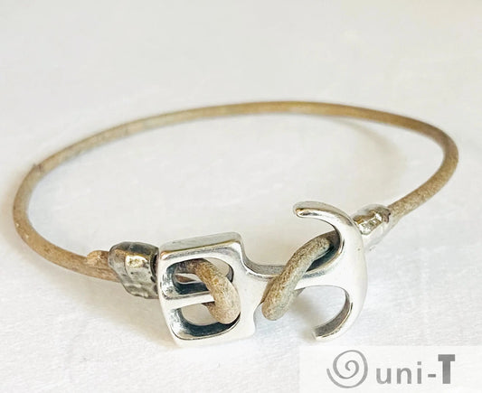 Brass Anchor and Leather Bracelet featuring nautical theme and minimalist design. Ideal for casual wear or as a unique nautical jewelry gift.