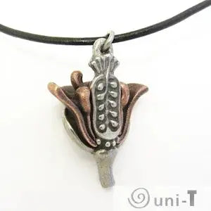 Close-up of Arabidopsis Flower Necklace - Elegant Garden Charm showing botanical-inspired pendant with intricate seed pod design in mixed metals.