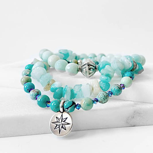Beaded Bracelet Stack - Beaded Stack Bracelets | 3 Piece Set with turquoise and aqua tones, silver charms, and gemstone beads displayed on marble.