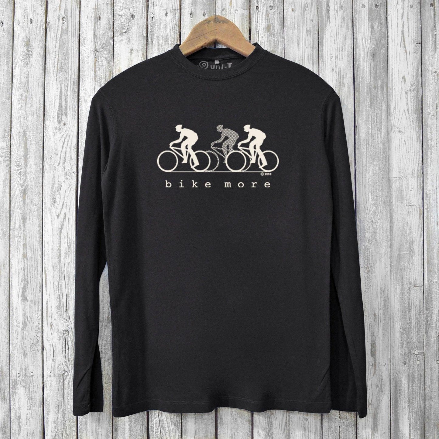 Bike More T-shirt - Eco-Friendly Bike T-shirt in black, showcasing minimalist cyclist print. Sustainable men's long sleeve shirt for biking enthusiasts.