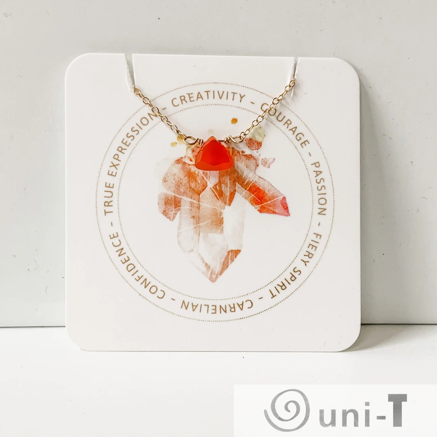 Carnelian Gemstone Necklace from Uni-T displayed on branded card highlighting creativity, courage, and passion with gemstone symbolism.