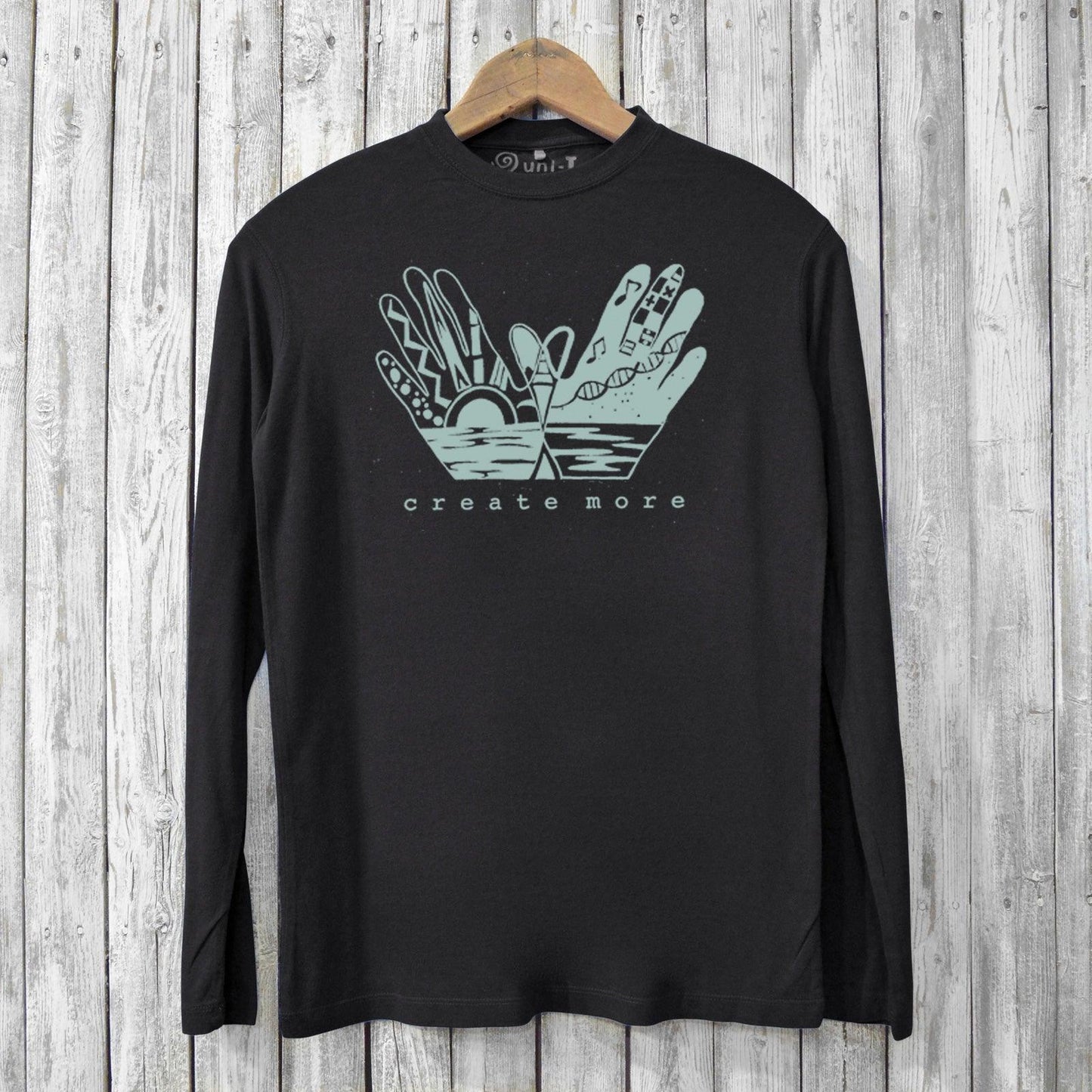 Create More T-shirts for Men - Bamboo Long Sleeve in black with artistic 'create more' hand design, perfect for eco-conscious and artistic wardrobes.
