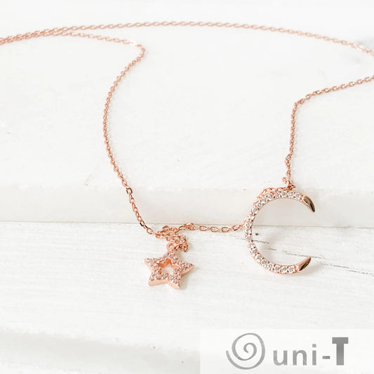 Dainty Pave Star and the Moon Necklace Janine Gerade