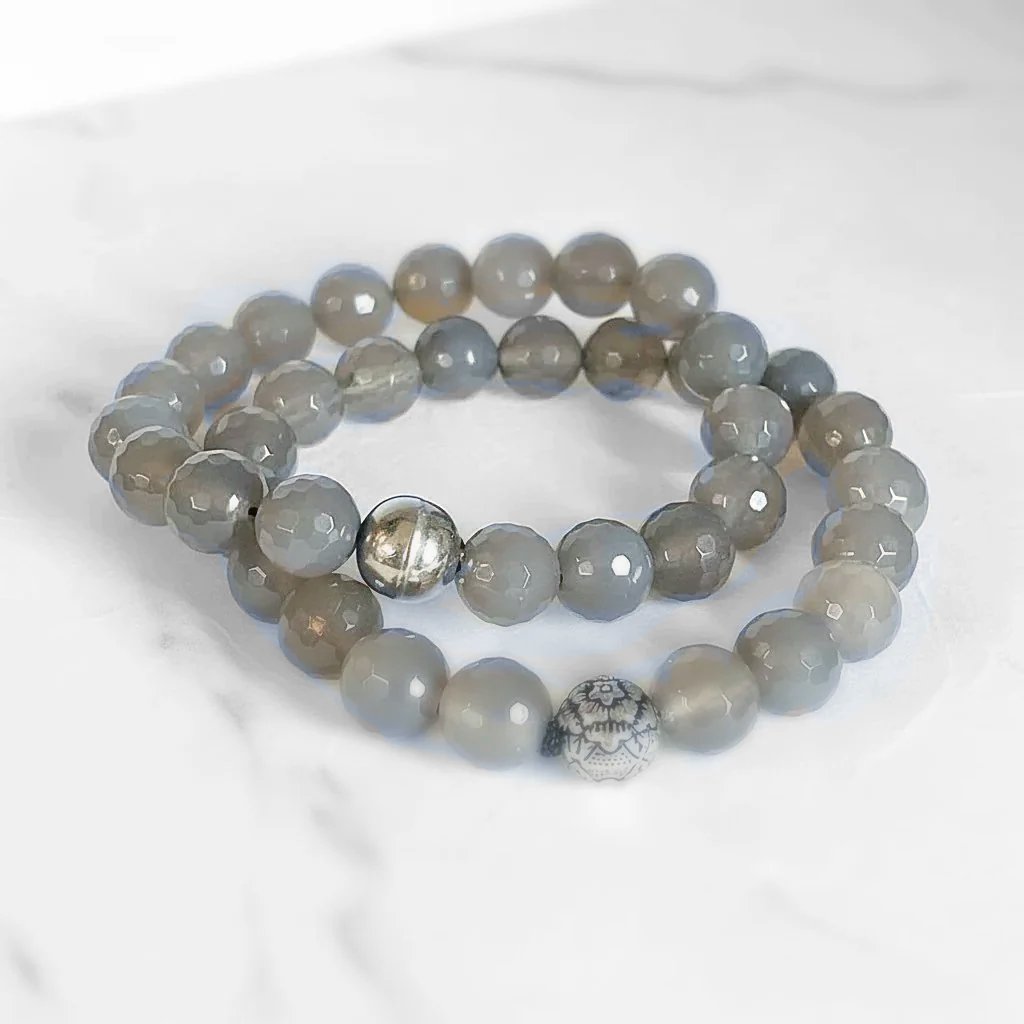 Double-layered Agate Gemstone Stretch Bracelet with faceted grey beads and silver accents. Fashionable and flexible fit for most wrists.