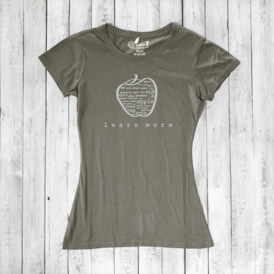 Olive green women's bamboo & organic cotton apple graphic tee with 'learn more' text, perfect sustainable gift for educators.