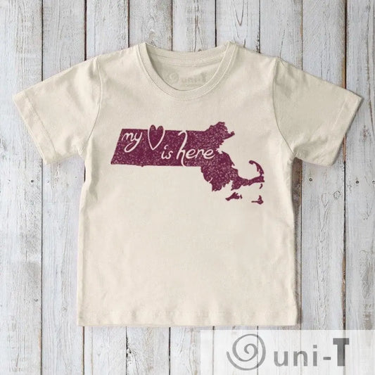 Children's organic cotton T-shirt in cream with maroon Massachusetts state graphic and 'My Heart Is Here' text. Sustainable apparel by Uni-T.