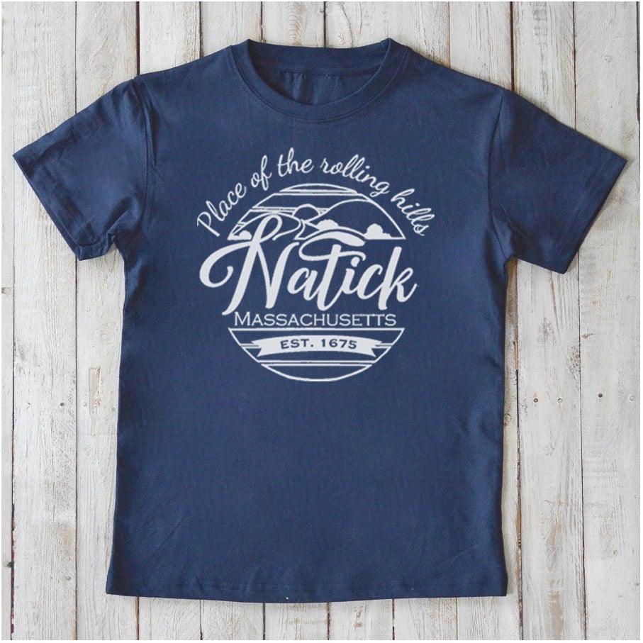 Navy blue Kids' Natick Organic Cotton T-Shirt with white Massachusetts town pride graphic. Sustainable Uni-T tee for children.