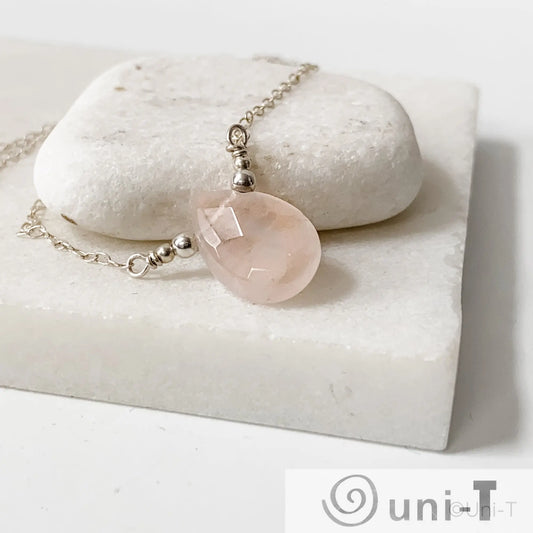 Dainty Rose Quartz Gemstone Necklace from Uni-T with faceted pink gemstone and sterling silver beads on an 18-inch chain.