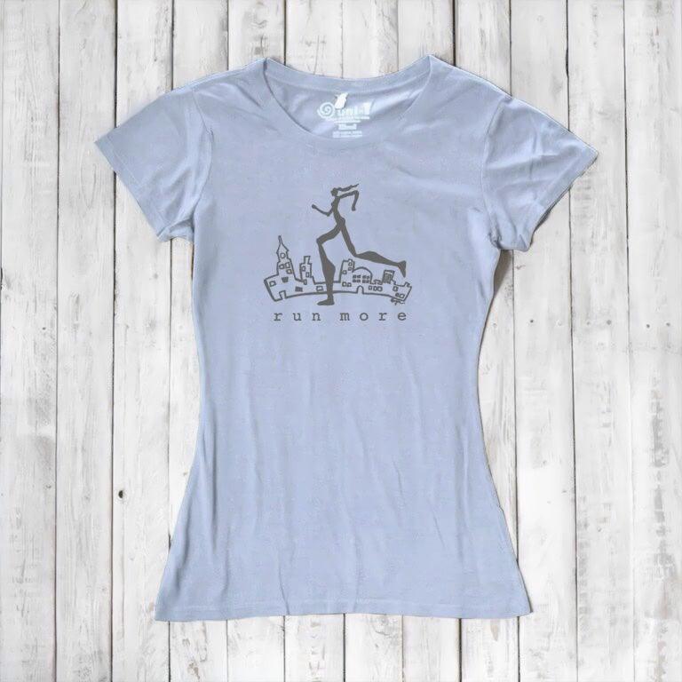 Light blue women's sustainable running t-shirt with dark 'Run More' print, made from bamboo and organic cotton for eco-conscious athletes.