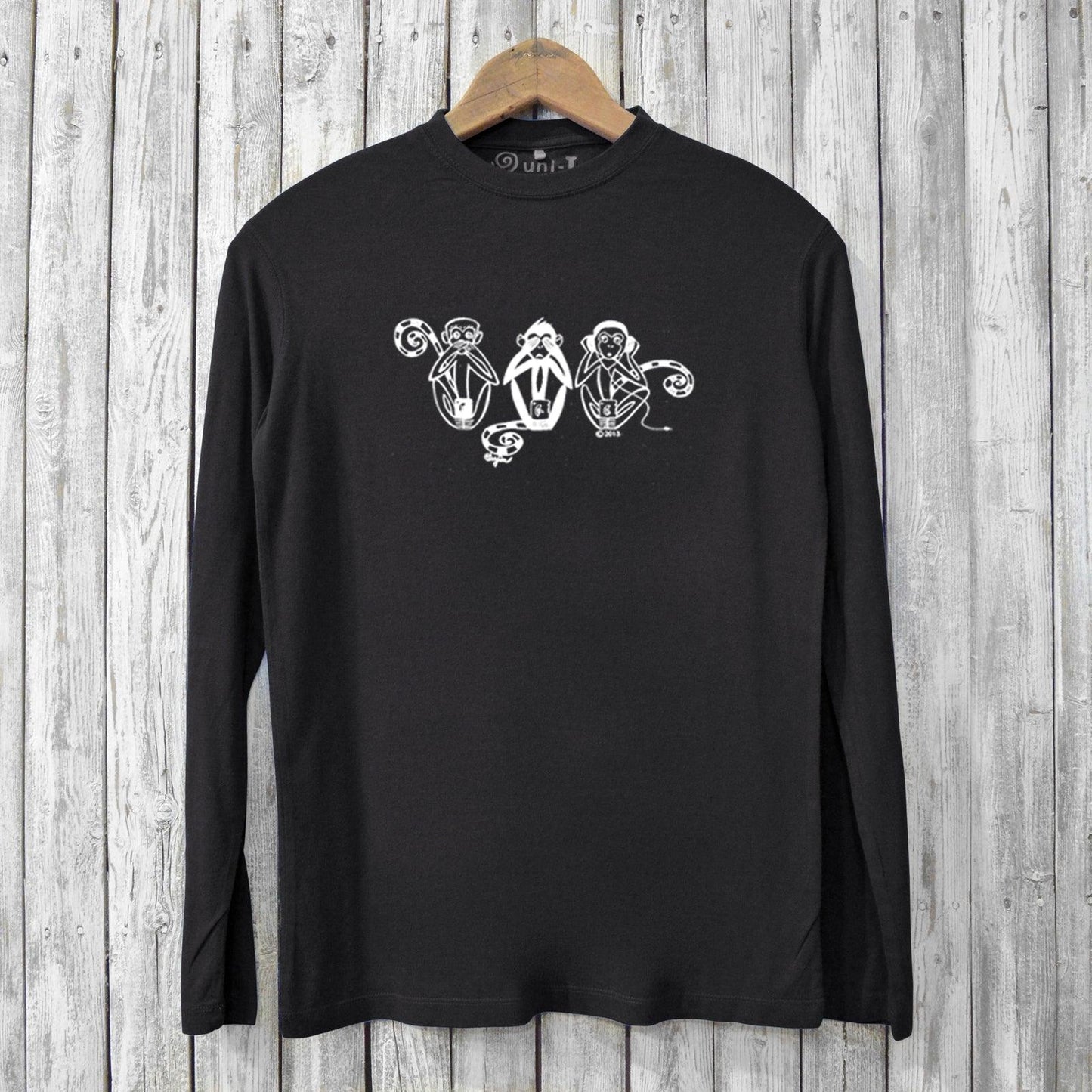 Black men's bamboo long sleeve graphic tee with white 'See No Evil Hear No Evil Speak No Evil' monkeys. Soft, eco-friendly fashion for conscious shoppers.