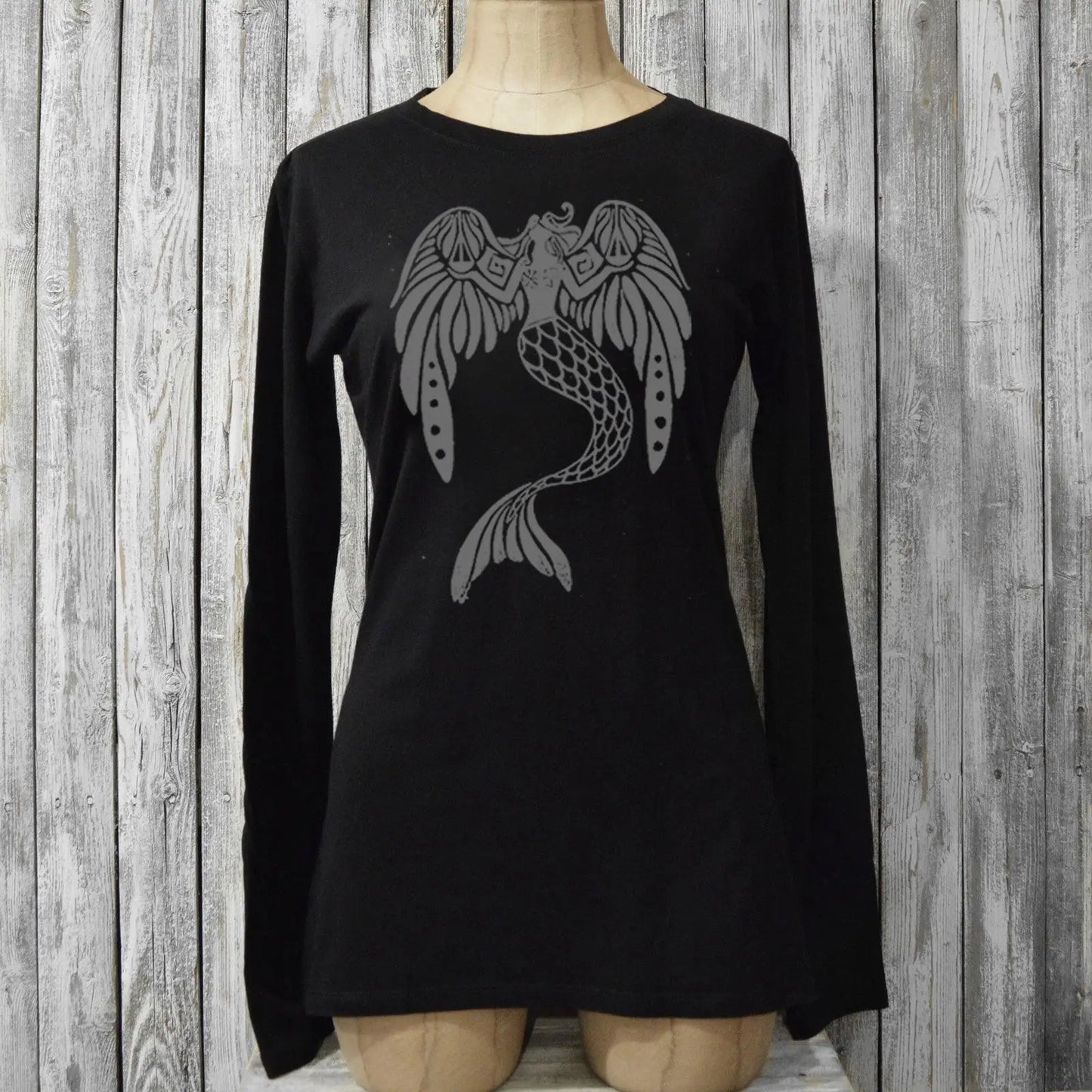 Black women's long sleeve graphic tee with fantasy mermaid and angel wings design, 'The Magnificent' by Uni-T. Ethically made from bamboo and cotton.