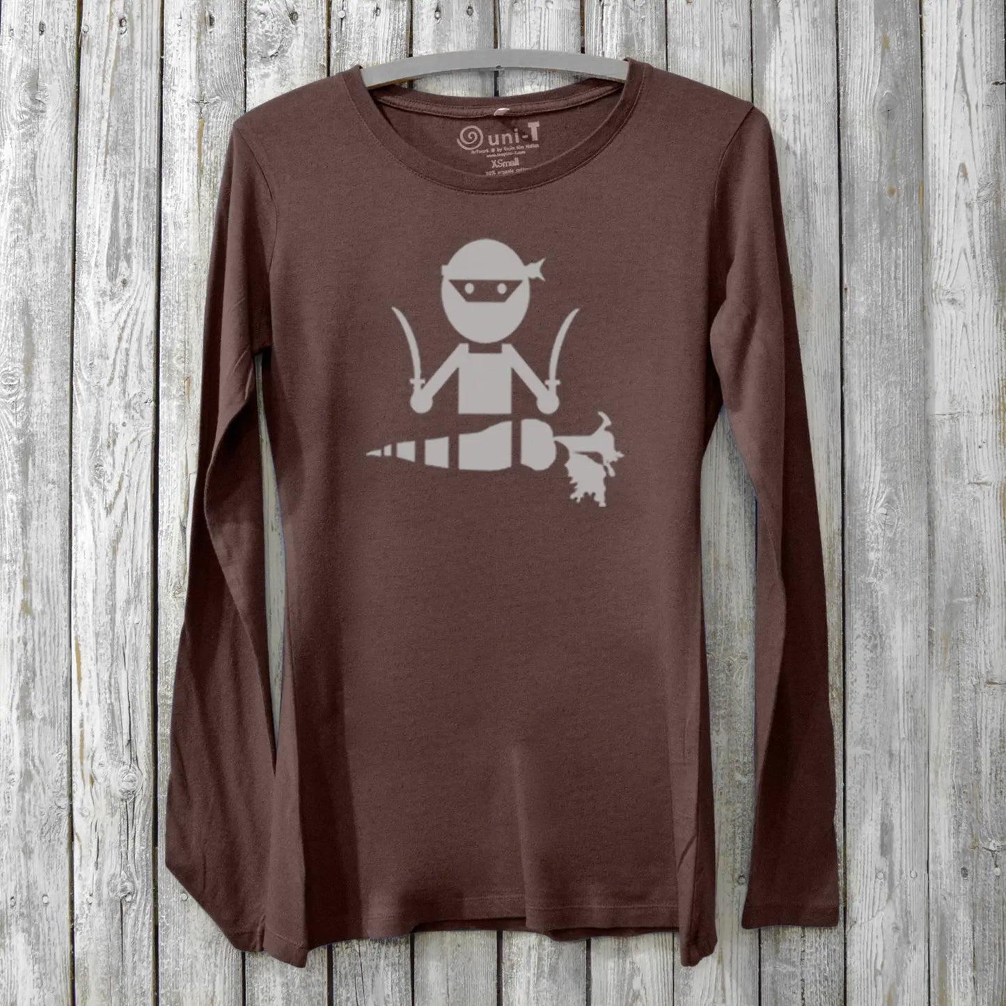 Dark brown Veggie Ninja women's long sleeve bamboo t-shirt with a quirky ninja carrot graphic, perfect for plant-based and sustainable fashion enthusiasts.