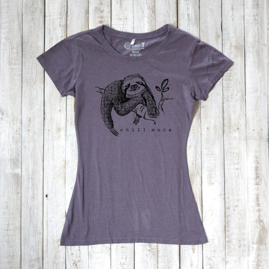 Purple fitted women's bamboo and organic cotton T-shirt featuring a hand-drawn sloth and 'Chill More' text. Sustainable animal lover gift.