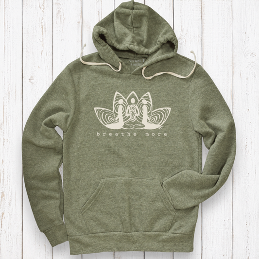 Heather olive hoodie on white wood.png