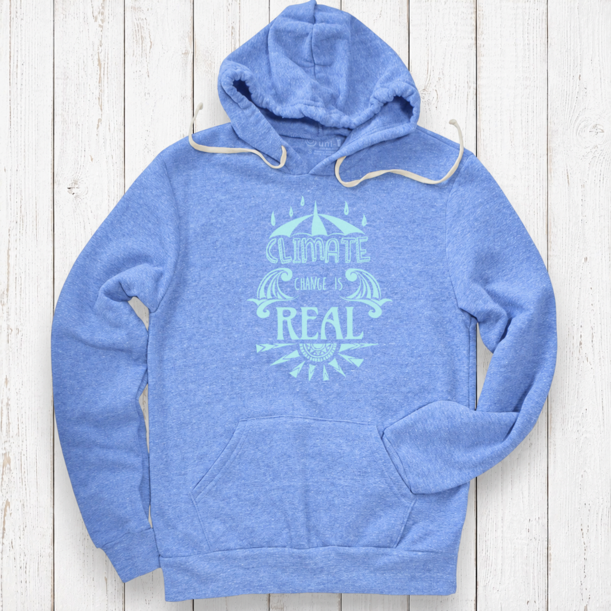 Light periwinkle hoodie on white wood.png