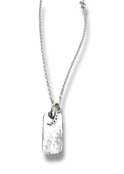 Sterling silver necklace with engraved pendant and moon detail