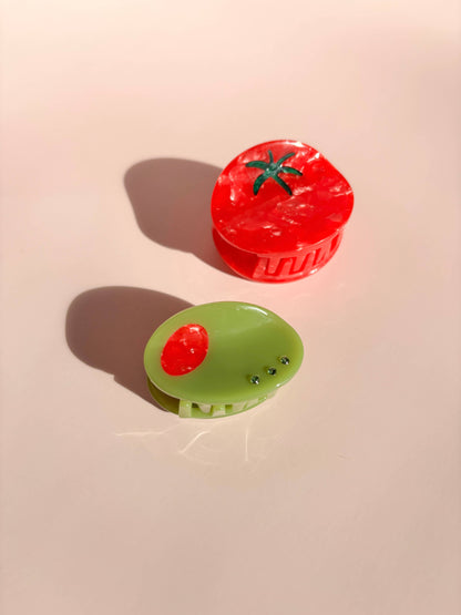 Olive Claw Clip - Cellulose Acetate paired with a tomato-shaped clip, highlighting quirky and durable hair accessories for everyday wear.
