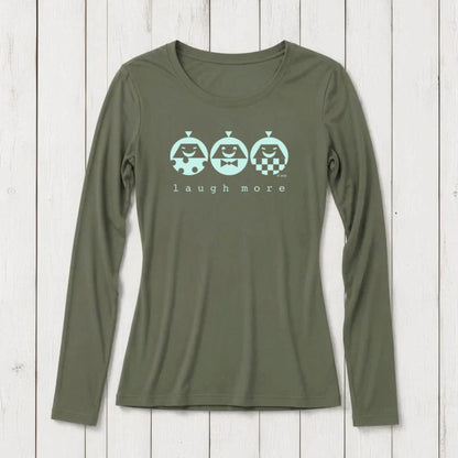 Olive green long sleeve T-shirt with playful graphic of three smiling characters and the phrase 'laugh more' printed below, made from soft cotton blend, casual wear for women.